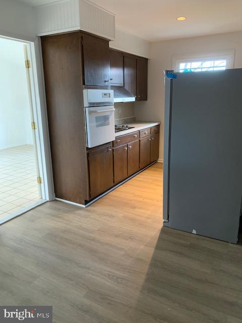 3121 Mt Zion Road Upperco, MD 21155 - Photo 5 of 43 a kitchen with stainless steel appliances a refrigerator and a stove