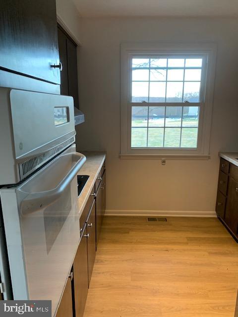 3121 Mt Zion Road Upperco, MD 21155 - Photo 6 of 43 a view of storage and utility room with washer and dryer