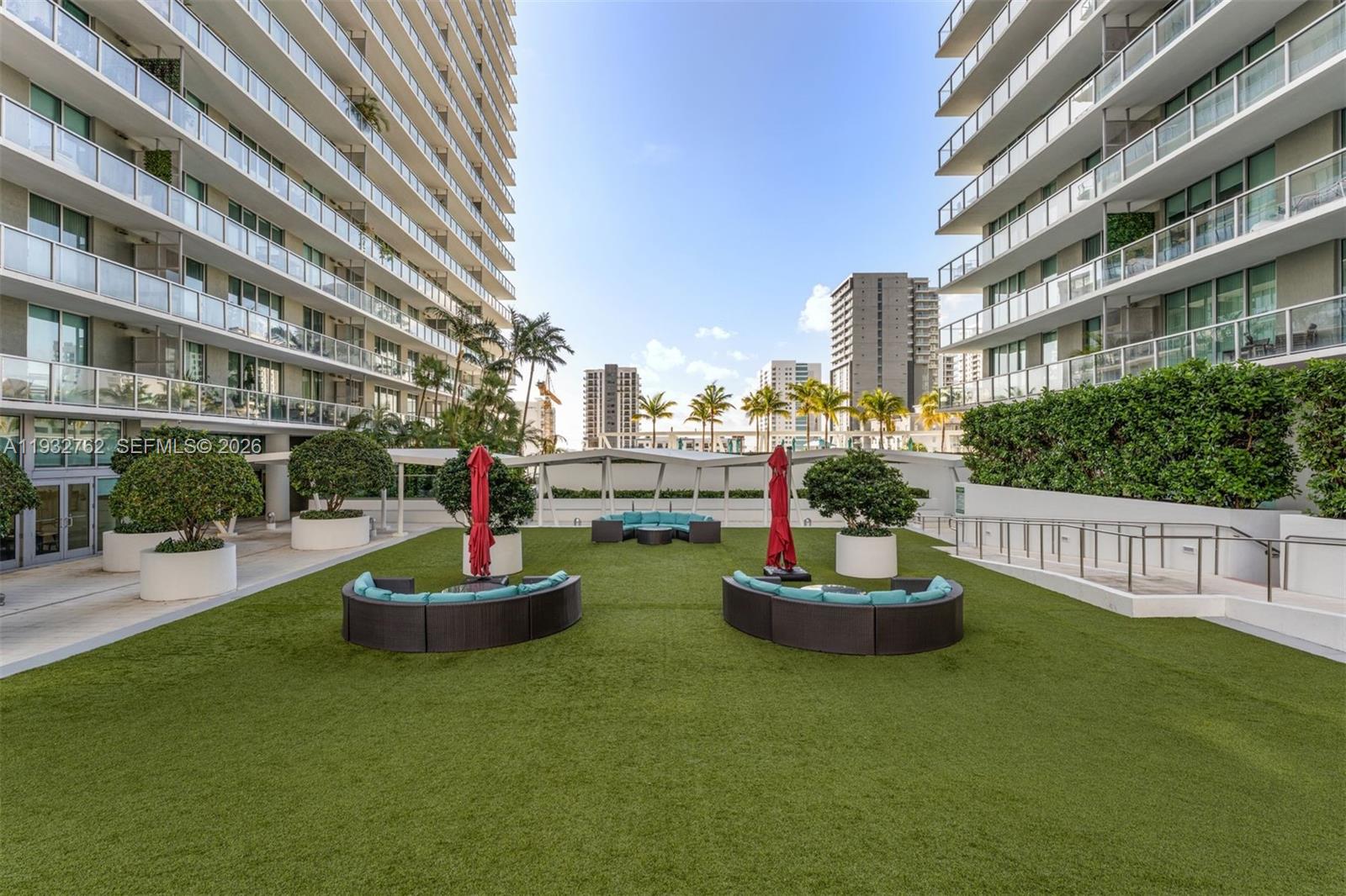 1111 Southwest 1st Avenue, Unit 721N Miami, FL 33130 - Photo 33 of 41 a building view with a garden space