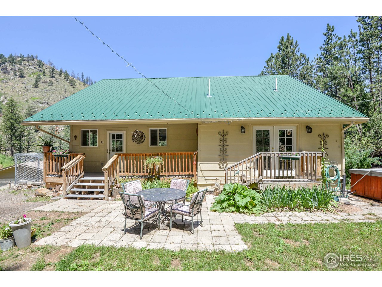 10285 Rist Canyon Road Bellvue, CO 80512 - Photo 1 of 39 Cozy Backyard