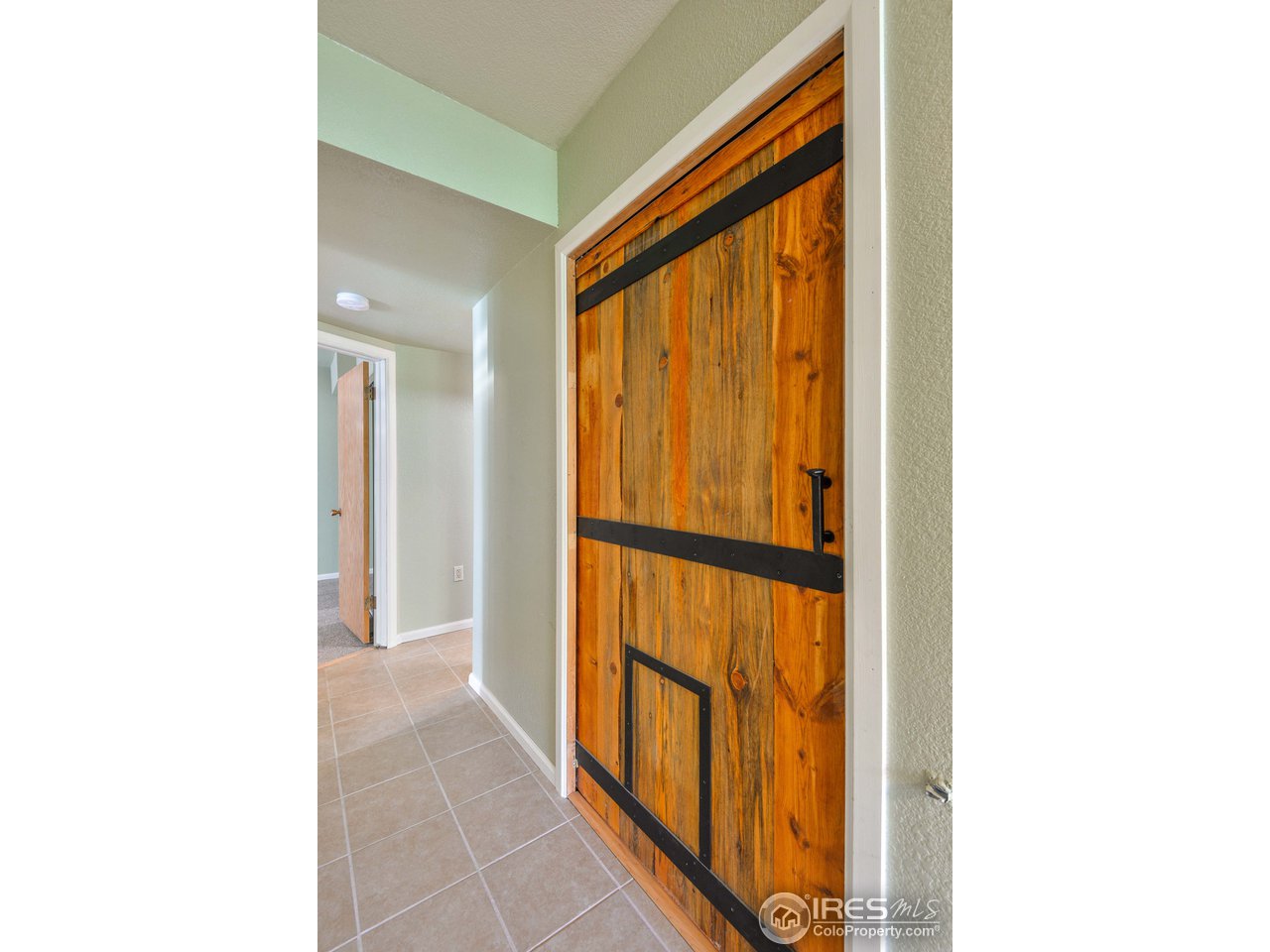 10285 Rist Canyon Road Bellvue, CO 80512 - Photo 27 of 39 Lower Level Entrance from Above