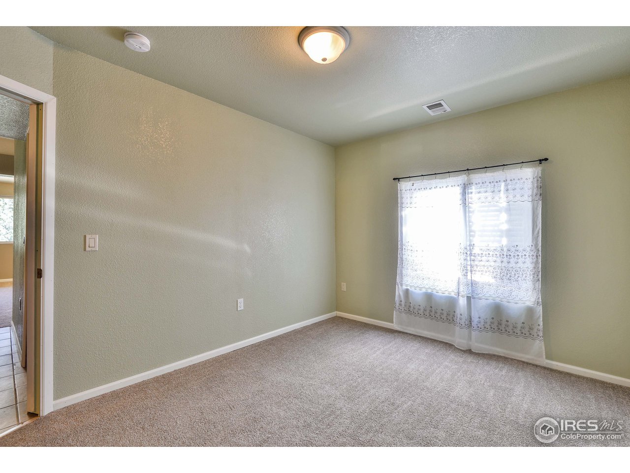 10285 Rist Canyon Road Bellvue, CO 80512 - Photo 30 of 39 Third Bedroom