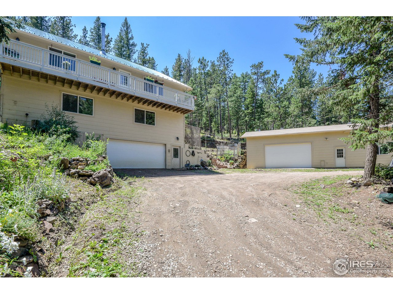 10285 Rist Canyon Road Bellvue, CO 80512 - Photo 5 of 39 Large Separate Garage on Right