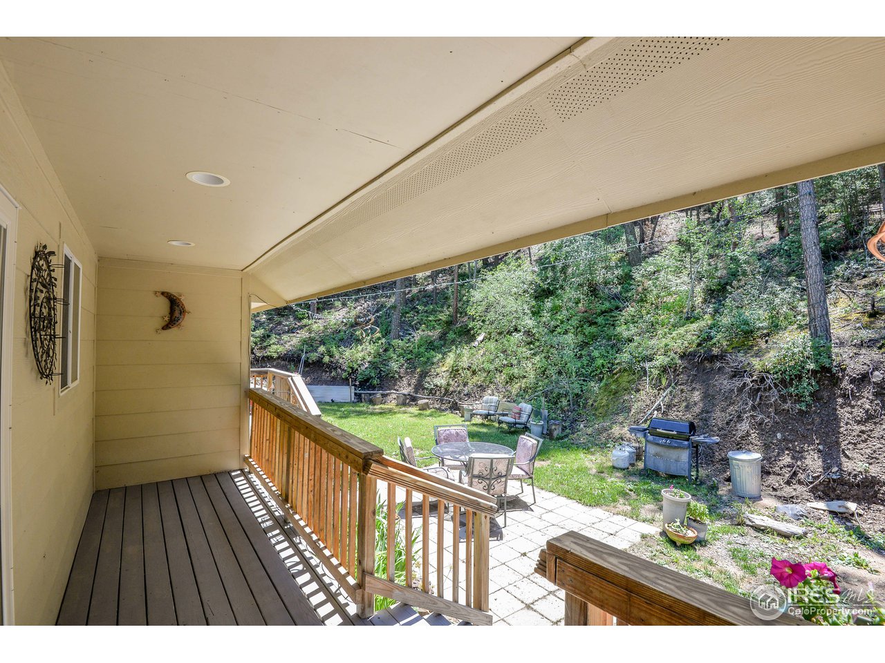 10285 Rist Canyon Road Bellvue, CO 80512 - Photo 10 of 39 Rear Deck to Patio