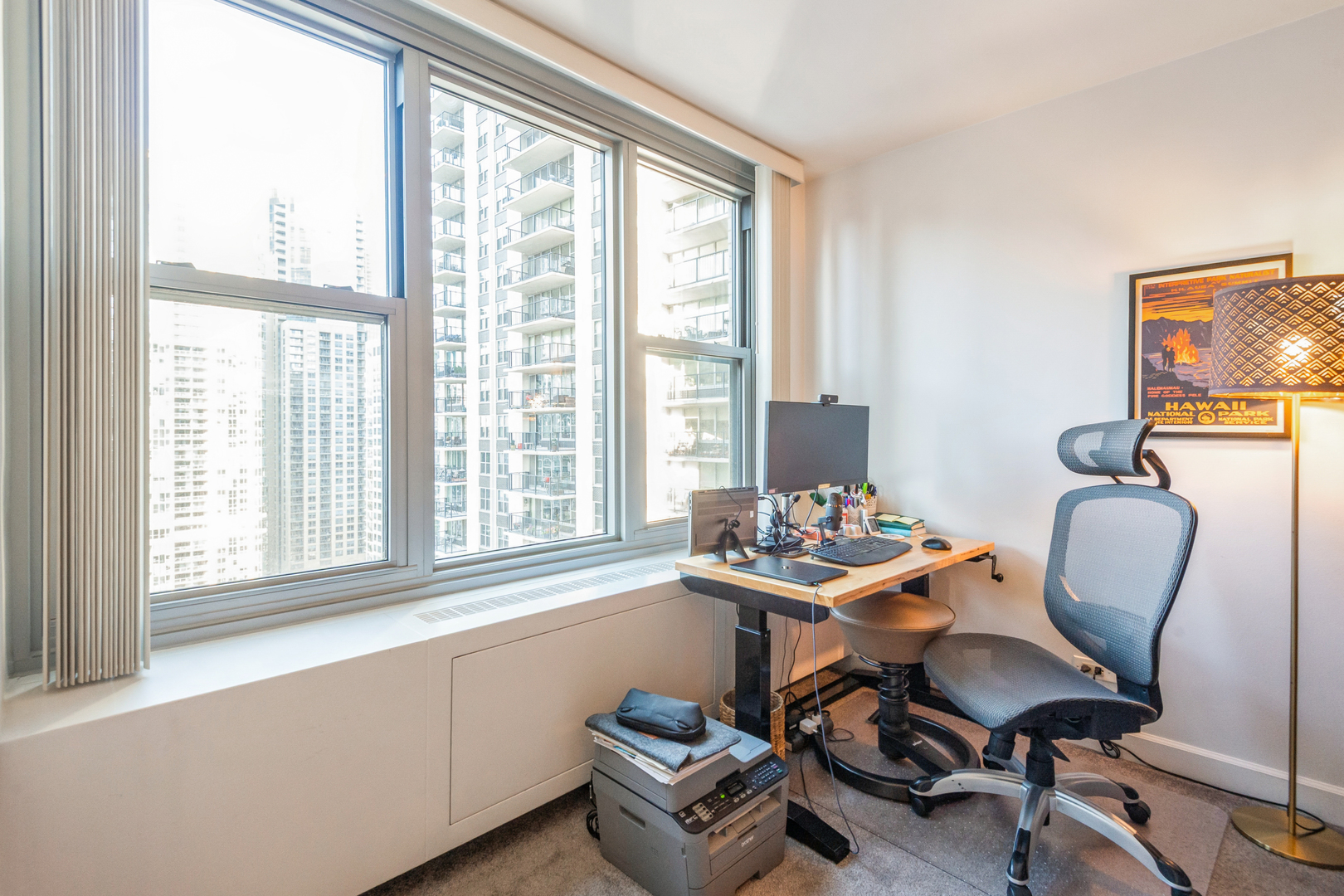 400 East Randolph Street, Unit 2518 Chicago, IL 60601 - Photo 12 of 49 a room with a workspace and a window