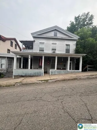 front view of a house with a porch