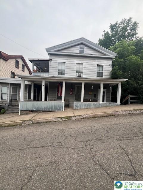 9 East Main Street, Unit C Weatherly, PA 18255 - Photo 1 of 13 front view of a house with a porch