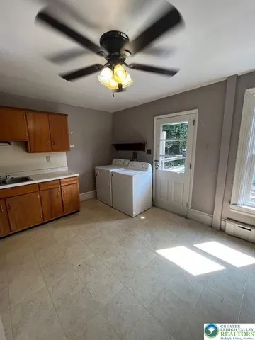 a view of empty room with windows