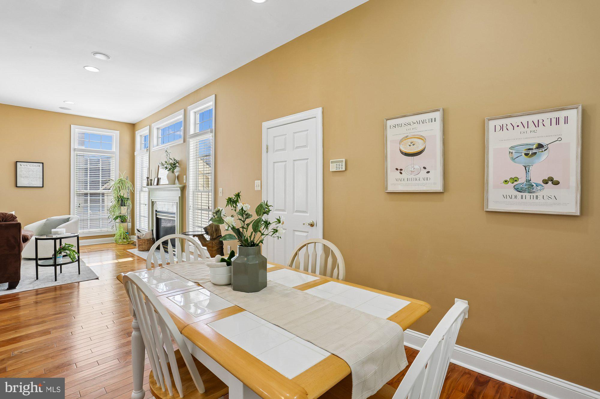 945 Main Street Gaithersburg, MD 20878 - Photo 13 of 57 a view of a dining room with furniture window and wooden floor