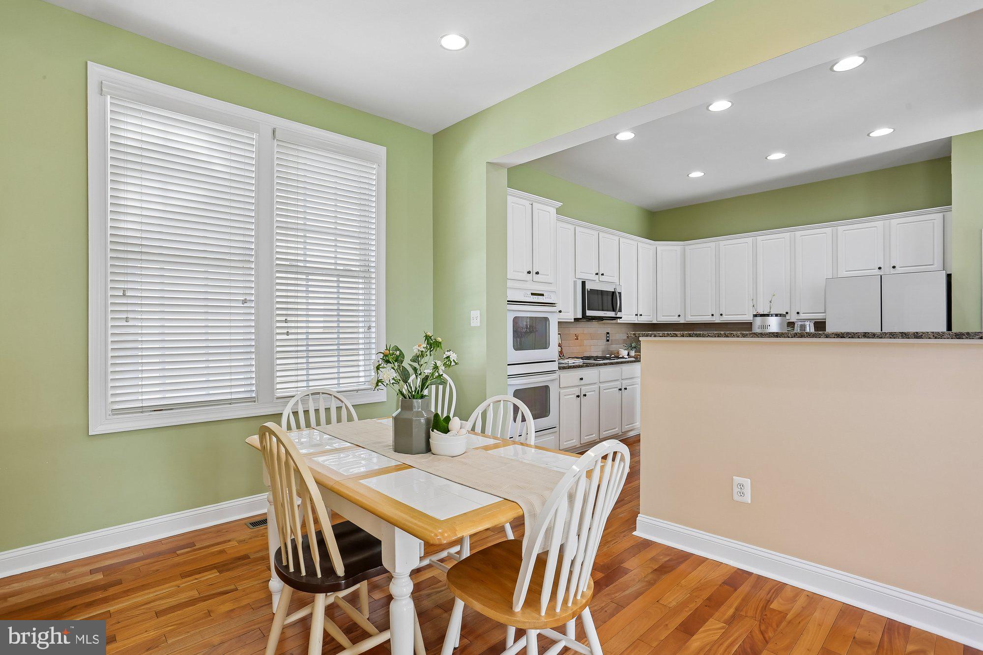 945 Main Street Gaithersburg, MD 20878 - Photo 14 of 57 a dining room with furniture and window