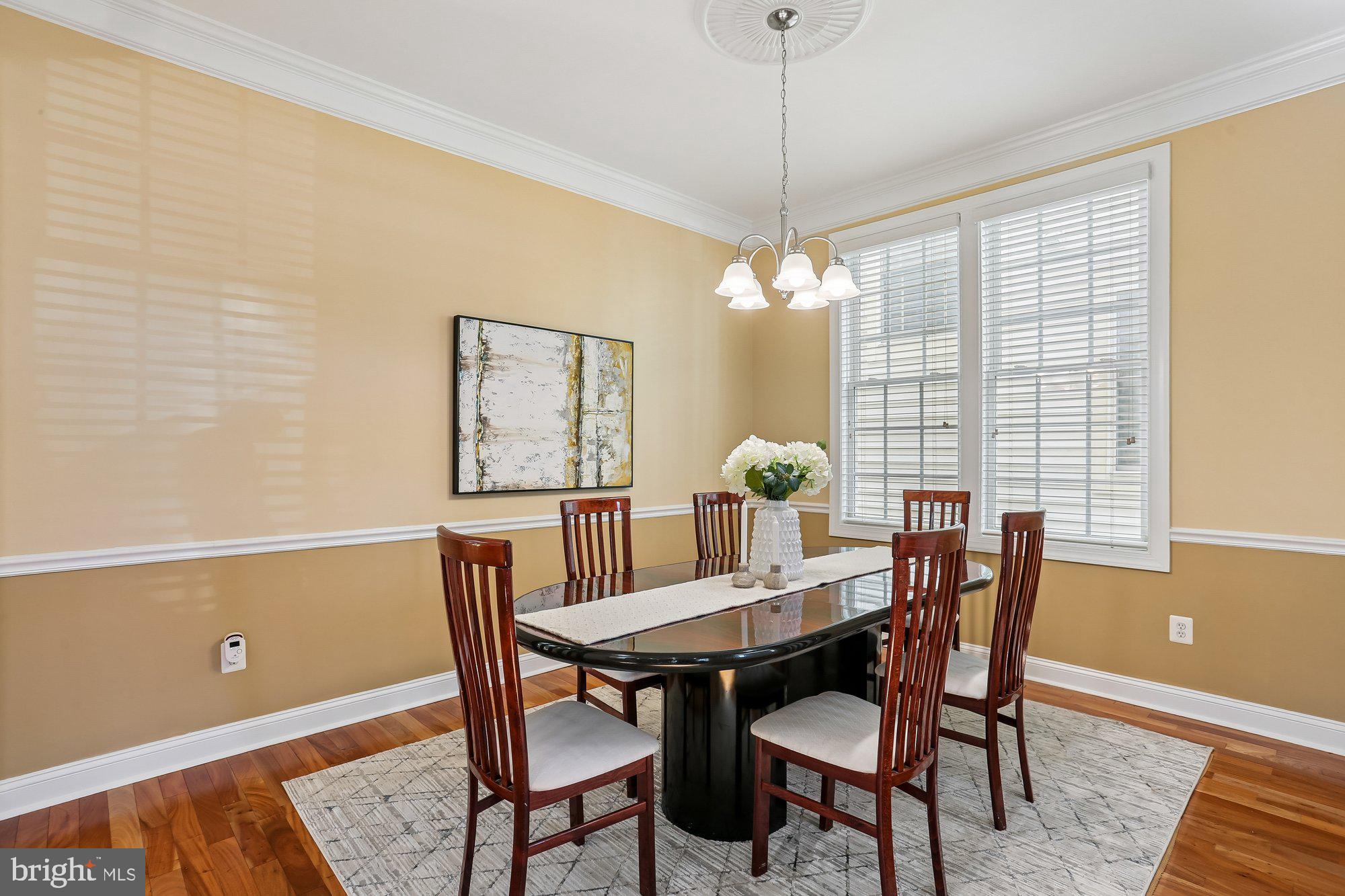 945 Main Street Gaithersburg, MD 20878 - Photo 17 of 57 a view of a dining room with furniture and window