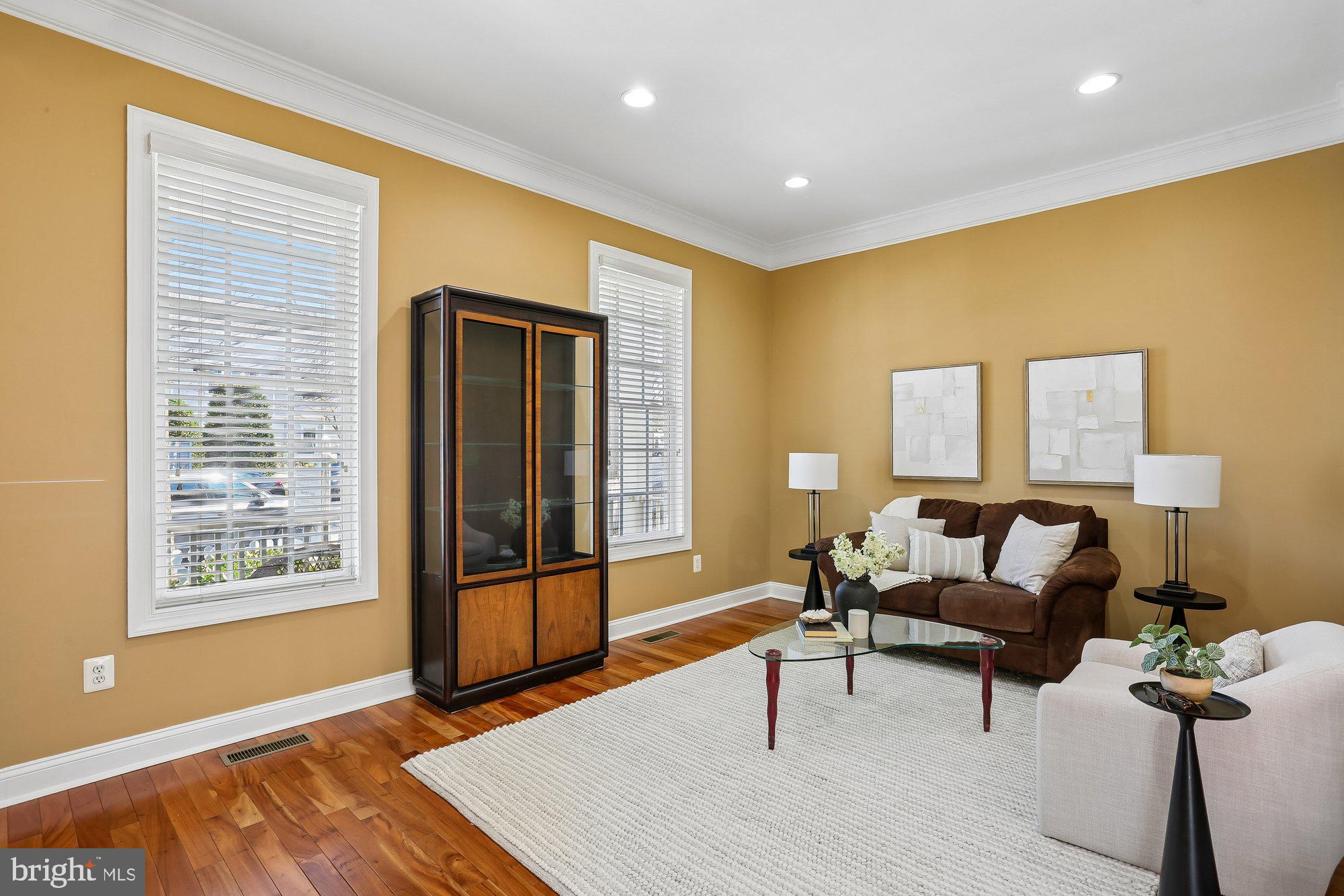 945 Main Street Gaithersburg, MD 20878 - Photo 19 of 57 a living room with furniture and a window