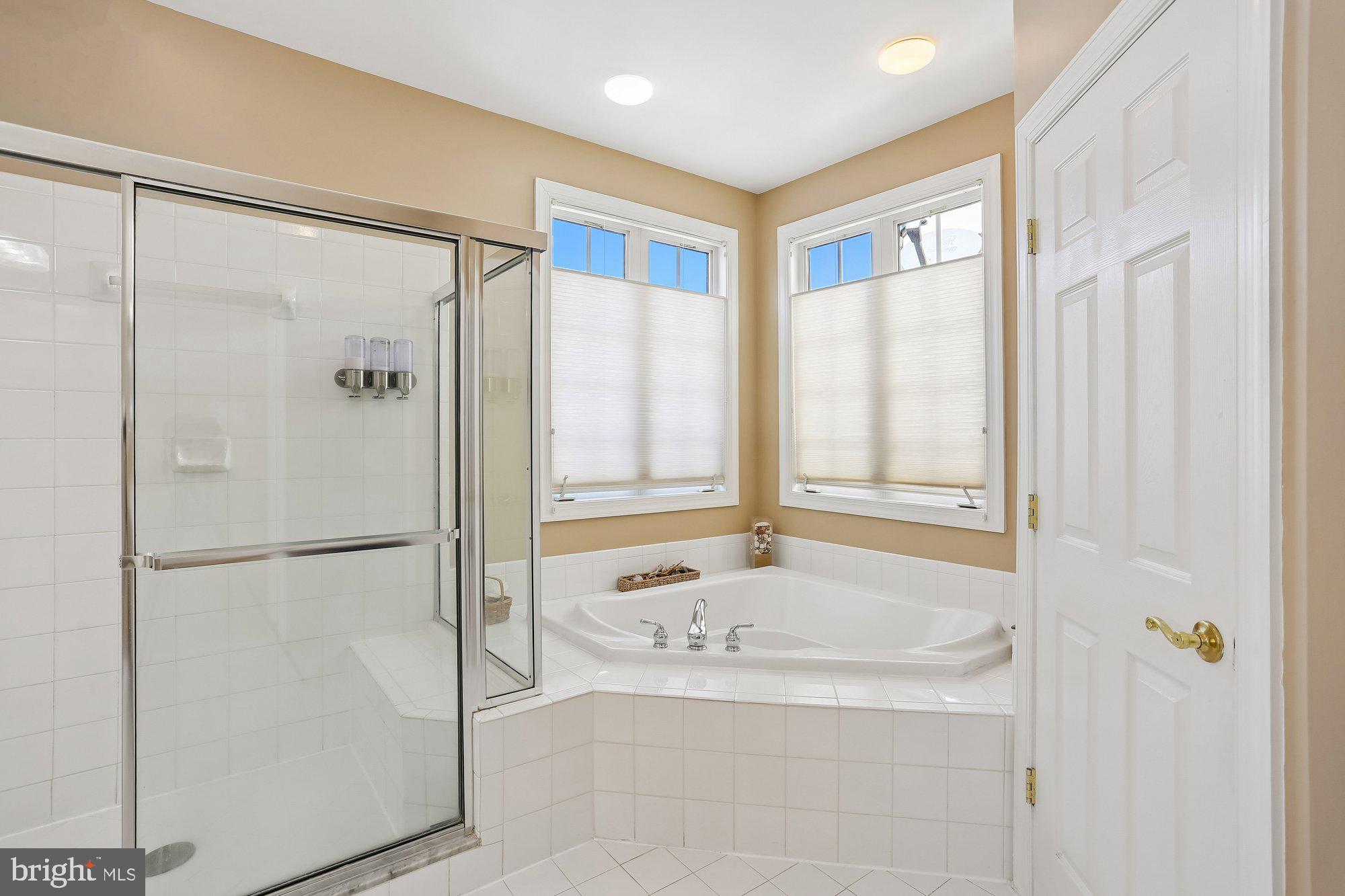 945 Main Street Gaithersburg, MD 20878 - Photo 28 of 57 Primary bath with glass shower & soaking tub