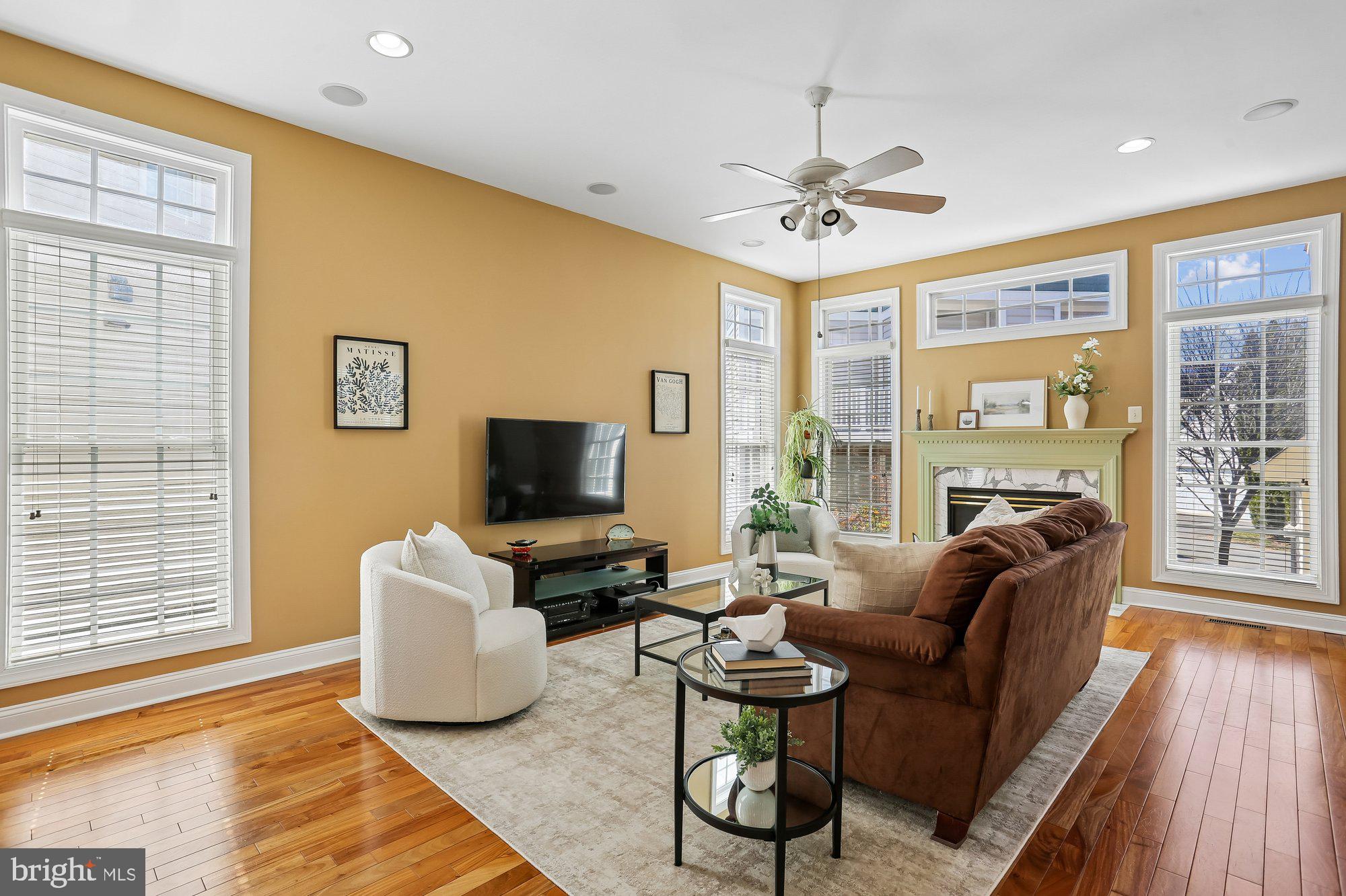 945 Main Street Gaithersburg, MD 20878 - Photo 3 of 57 a living room with furniture and a flat screen tv