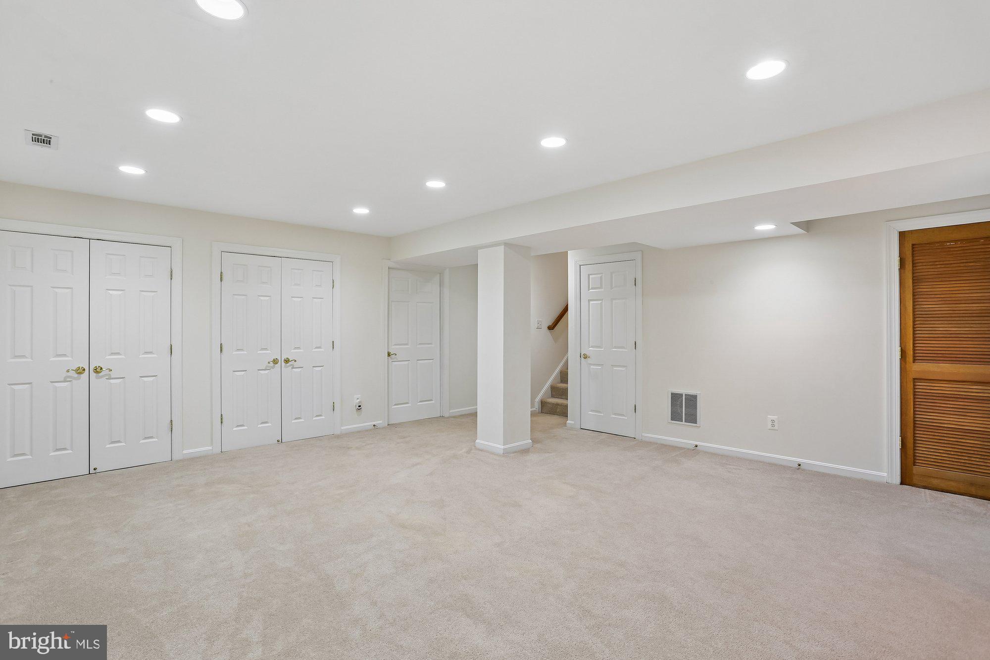 945 Main Street Gaithersburg, MD 20878 - Photo 38 of 57 Wall of closets for storage