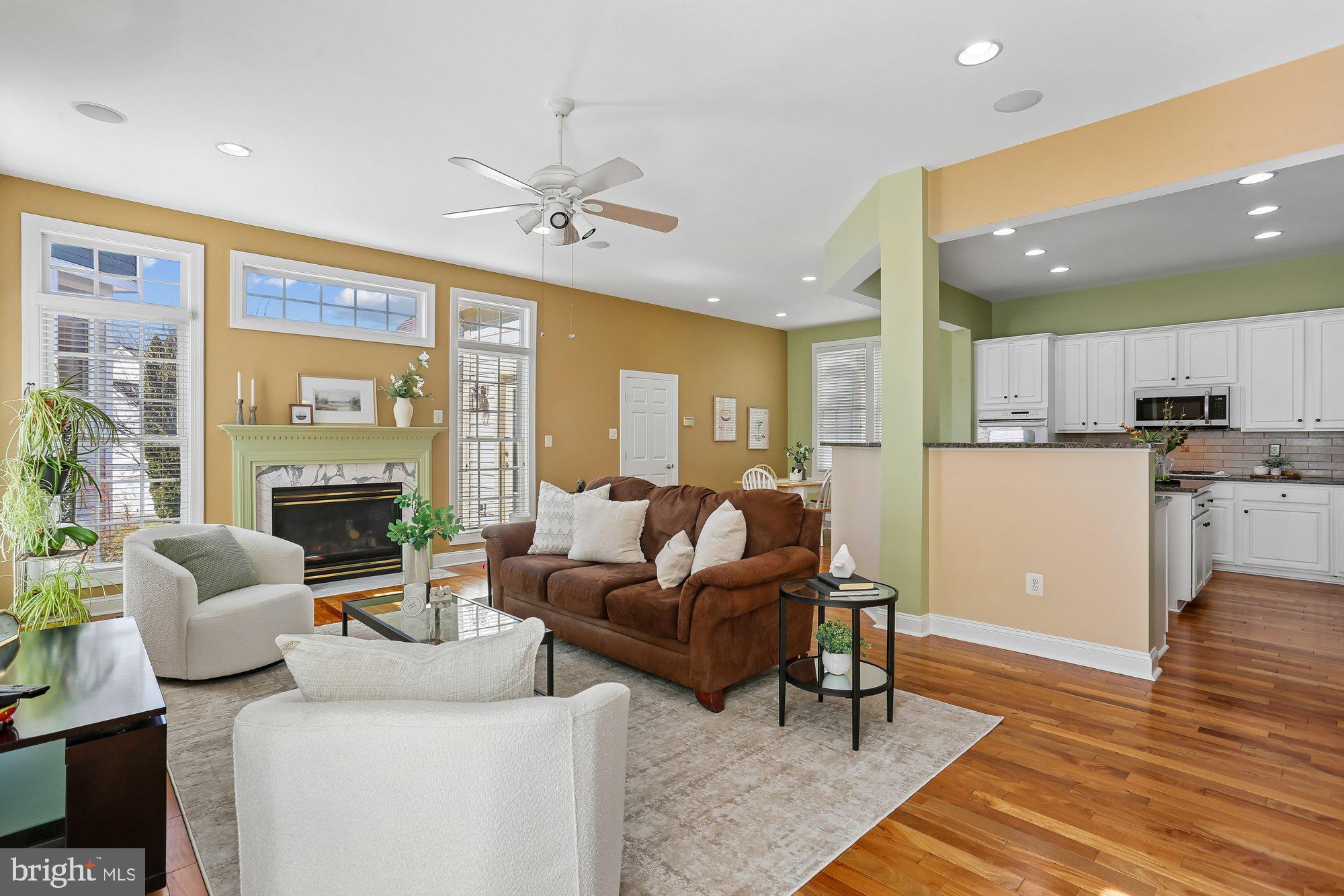 945 Main Street Gaithersburg, MD 20878 - Photo 4 of 57 a living room with furniture wooden floor and a large window