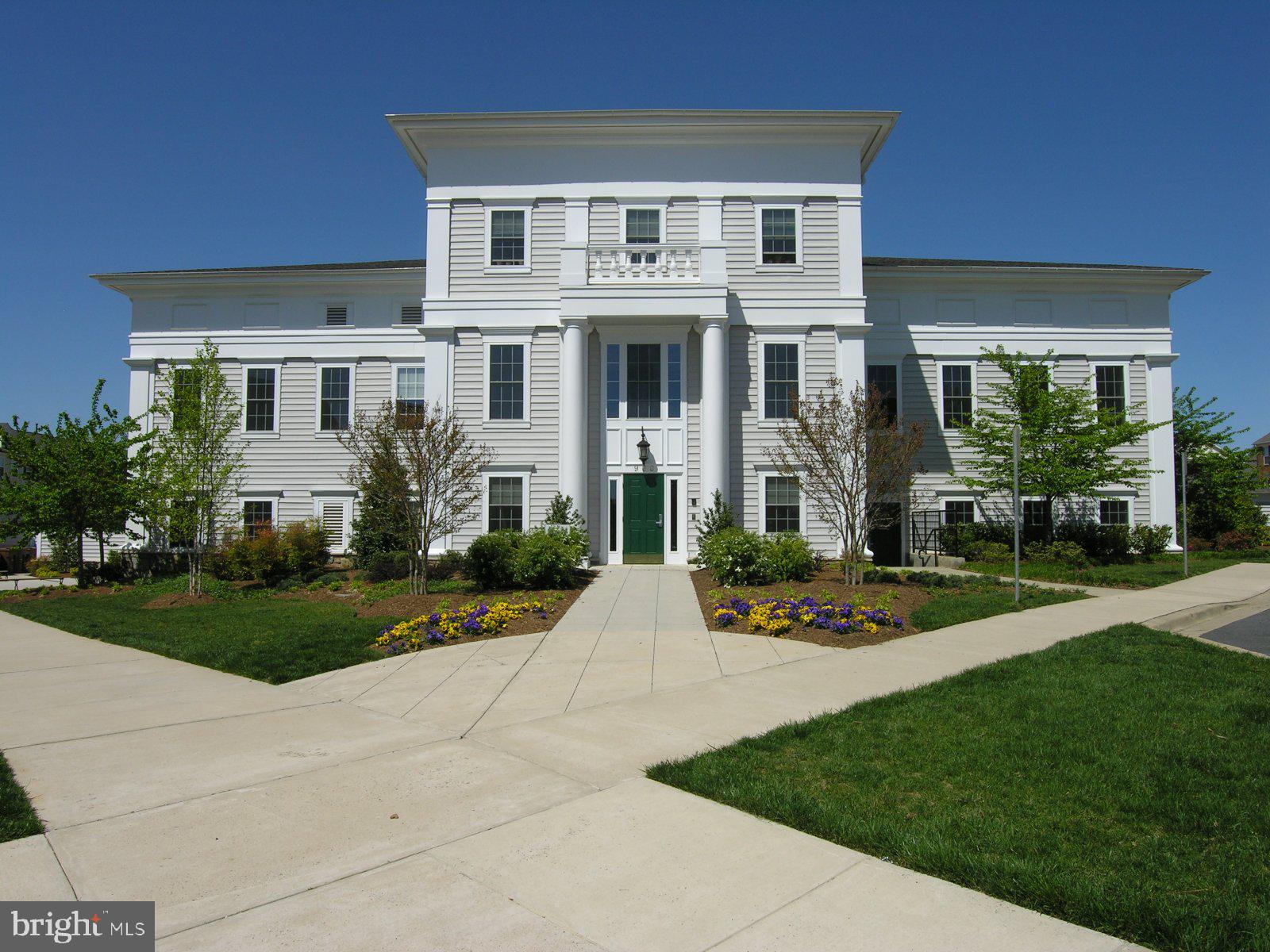 945 Main Street Gaithersburg, MD 20878 - Photo 49 of 57 a front view of a house with a yard