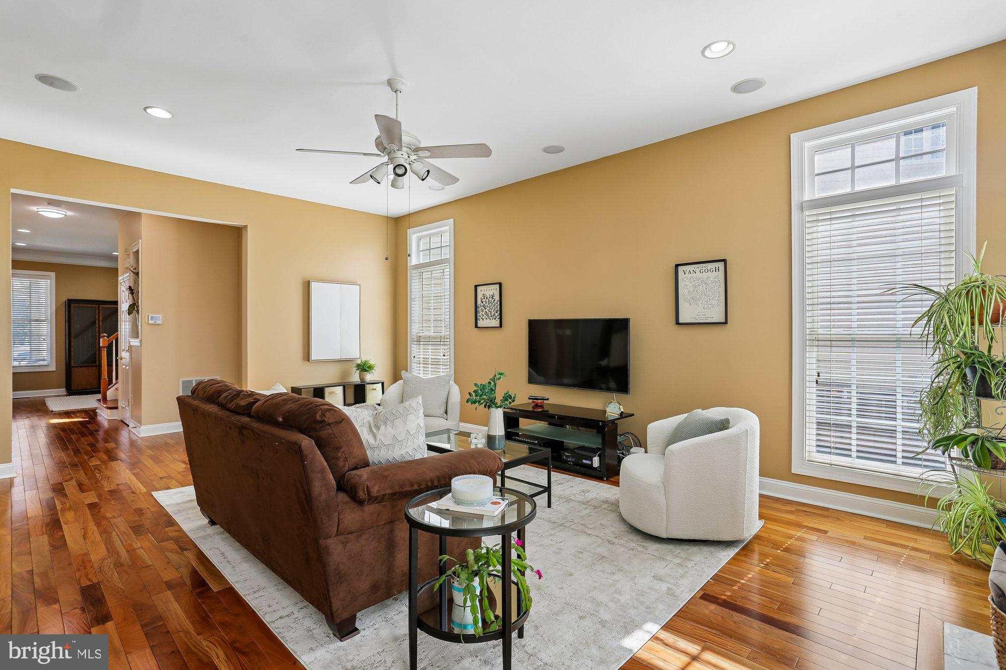 945 Main Street Gaithersburg, MD 20878 - Photo 5 of 57 a living room with furniture and a flat screen tv