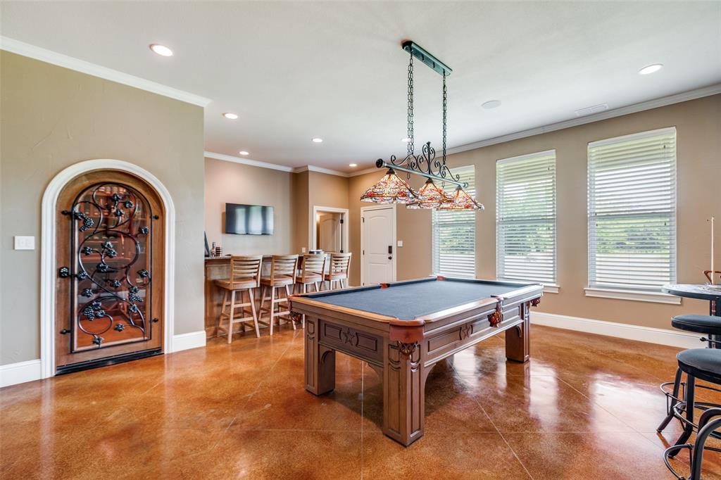 643 County Road 2255 Telephone, TX 75488 - Photo 18 of 40 Game room with ornamental molding, billiards table, recessed lighting, and bar area