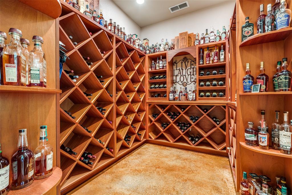643 County Road 2255 Telephone, TX 75488 - Photo 22 of 40 Wine room featuring light colored carpet