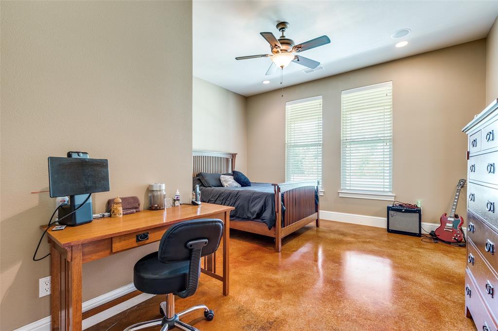 643 County Road 2255 Telephone, TX 75488 - Photo 24 of 40 Bedroom featuring finished concrete floors, a ceiling fan, and recessed lighting
