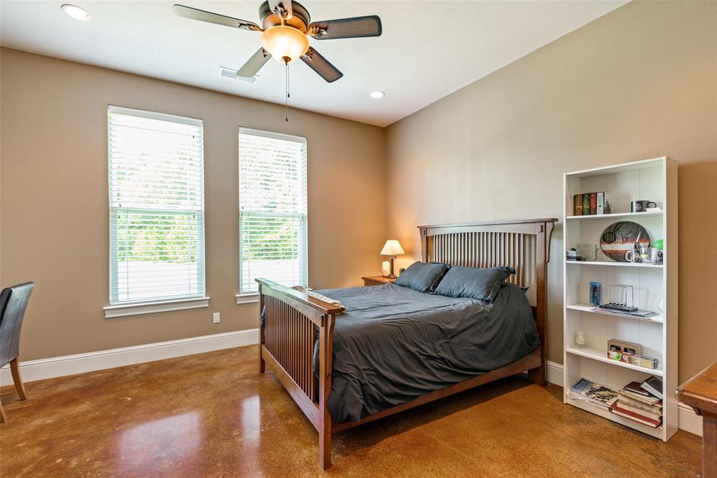 643 County Road 2255 Telephone, TX 75488 - Photo 26 of 40 Bedroom featuring concrete flooring, recessed lighting, and ceiling fan