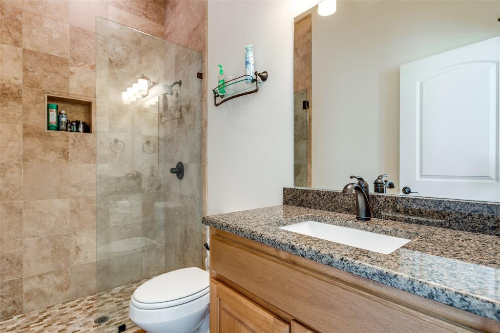 643 County Road 2255 Telephone, TX 75488 - Photo 27 of 40 Bathroom featuring vanity and walk in shower