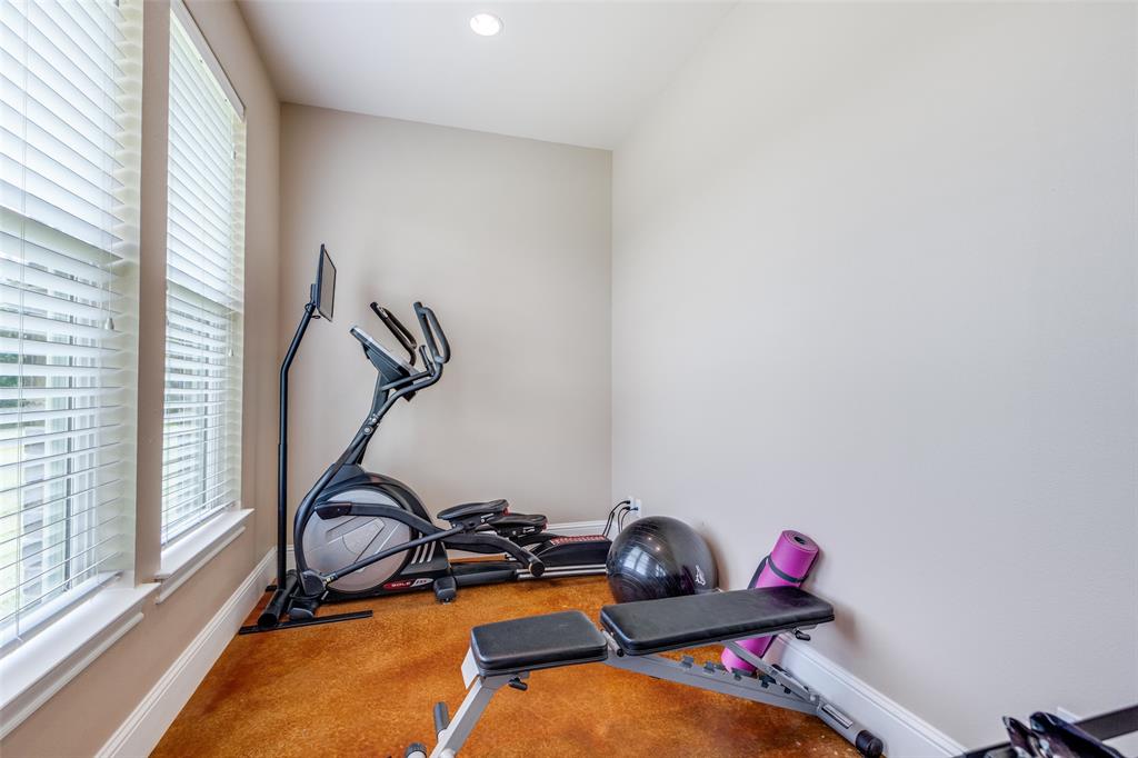 643 County Road 2255 Telephone, TX 75488 - Photo 30 of 40 Workout area featuring carpet and recessed lighting