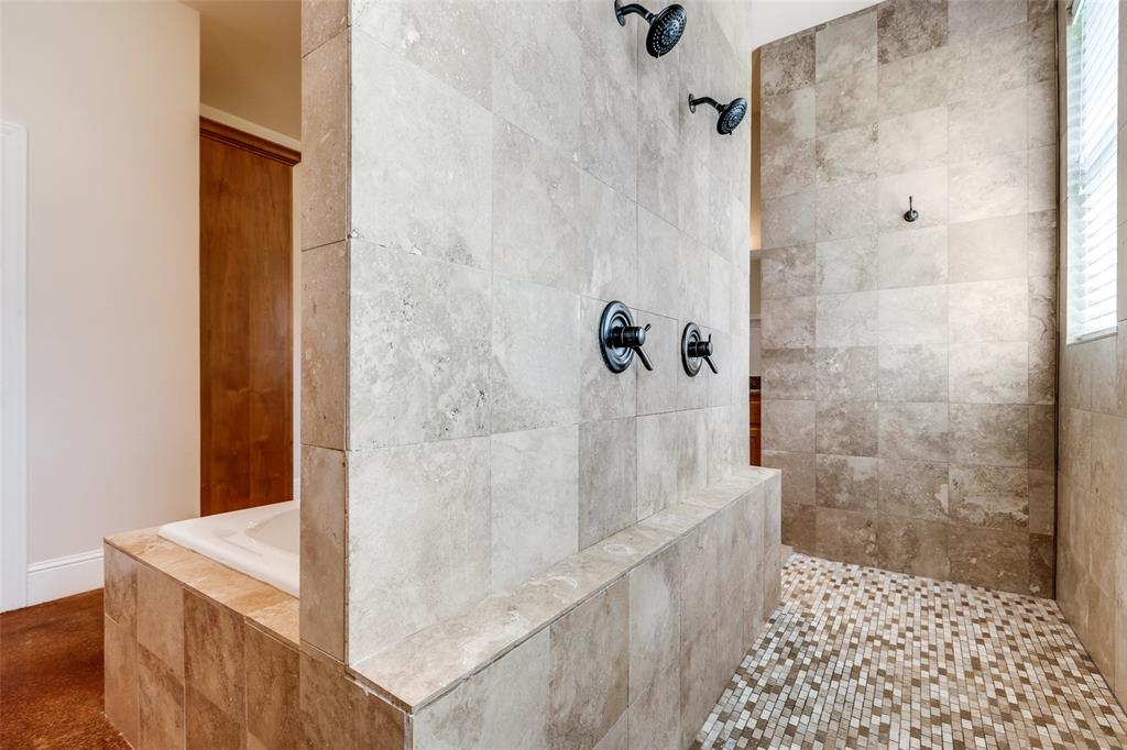 643 County Road 2255 Telephone, TX 75488 - Photo 34 of 40 Bathroom featuring a tile shower and a garden tub