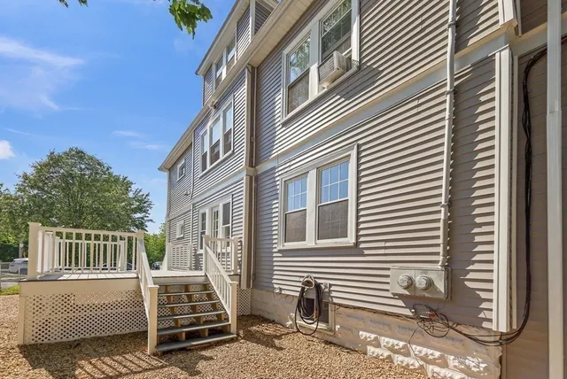 a view of a house with a roof deck