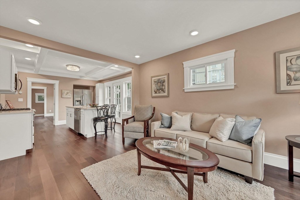 1540 Mystic Valley Parkway, Unit 1 Medford, MA 02155 - Photo 4 of 17 a living room with furniture and a wooden floor