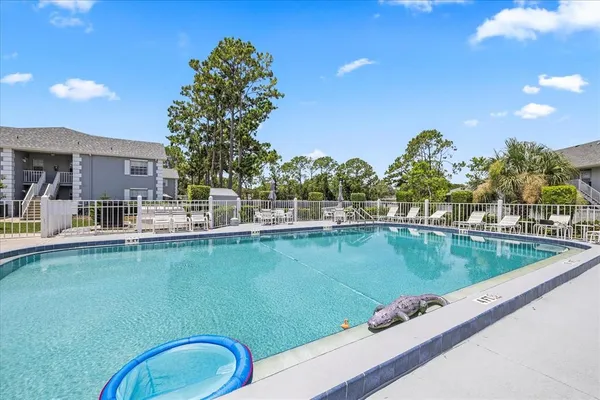 a view of a swimming pool with a outdoor space