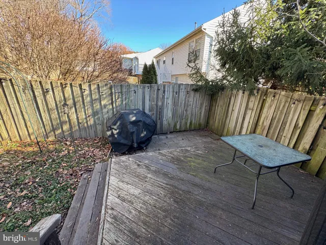 a view of a chairs and table on the wooden floor