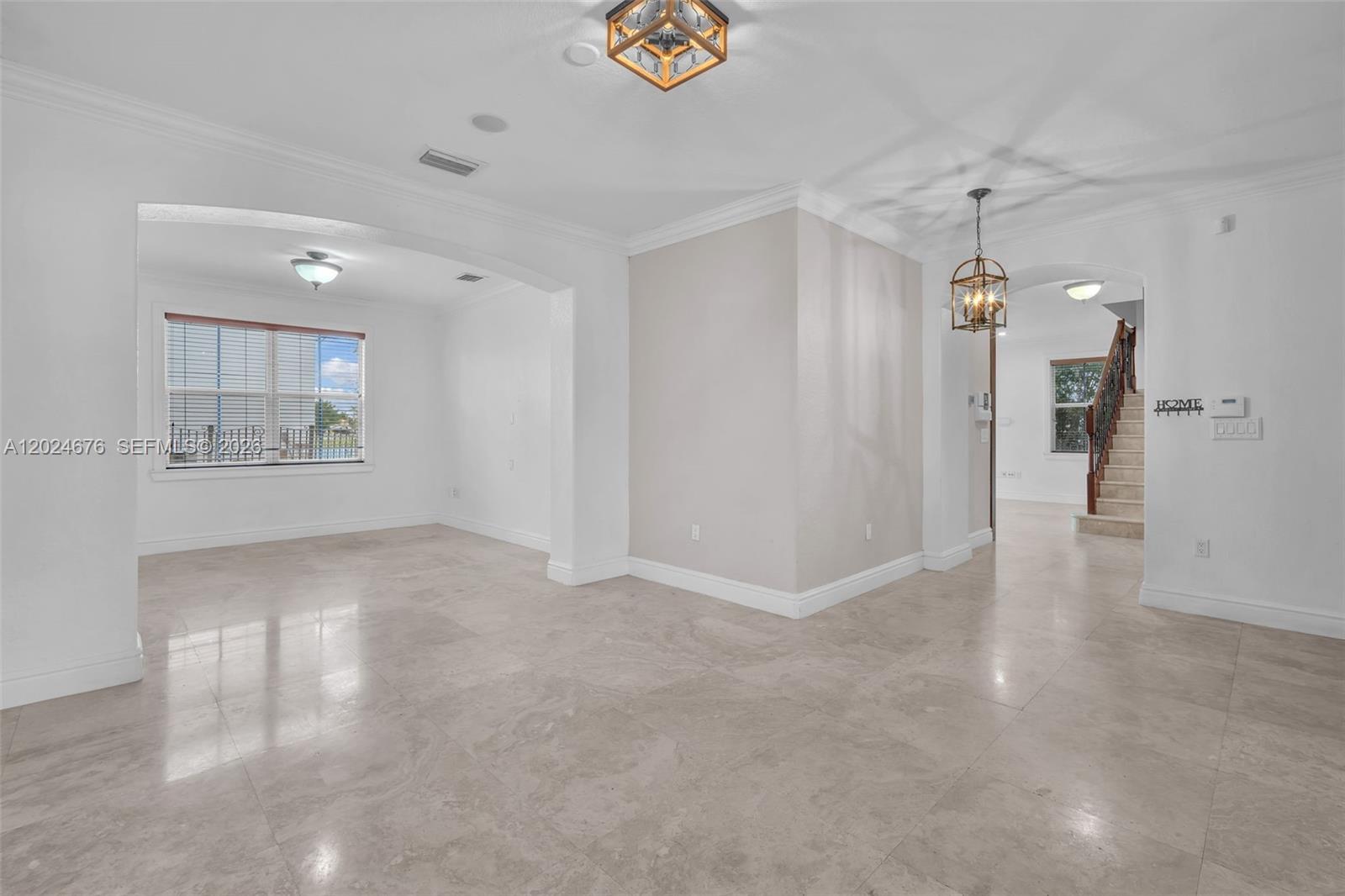 2155 Southwest 156th Court Miami, FL 33185 - Photo 14 of 57 a view of an empty room with a window