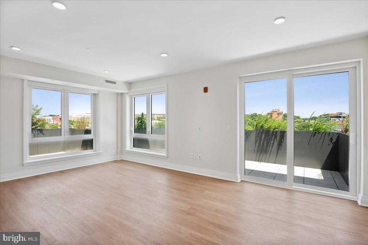 a view of livingroom with furniture and front door