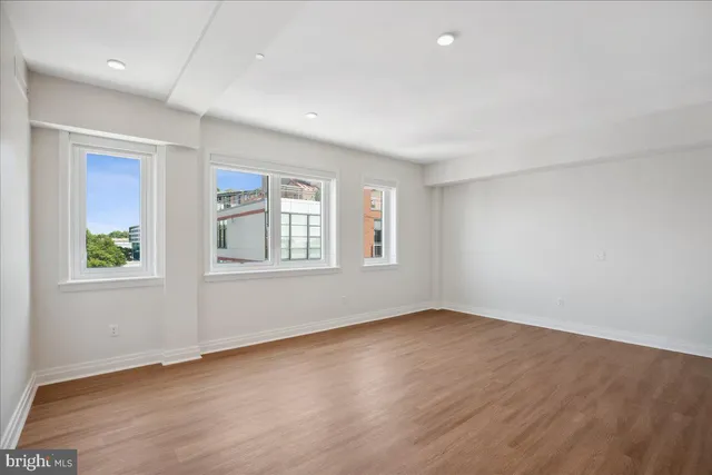 a view of kitchen with wooden floor