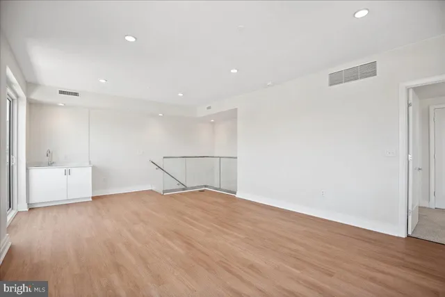 a view of a lake with a city skyline in the background