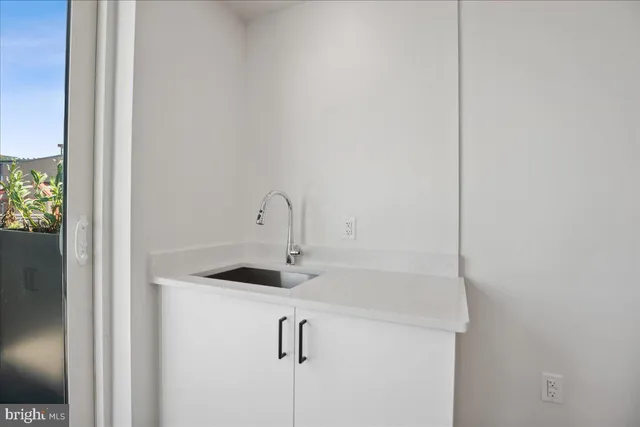 a view of a livingroom with wooden floor