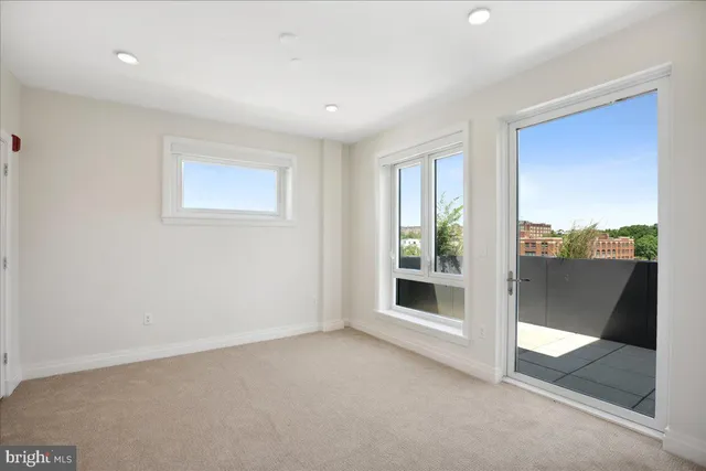 a bathroom with a double vanity sink and mirror