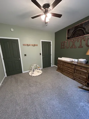 a view of a livingroom with furniture