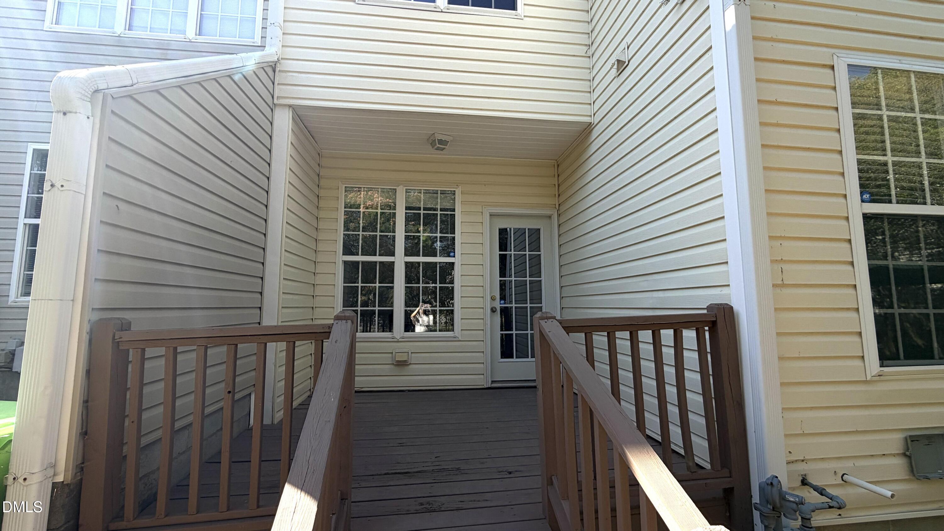 4123 Standing Rock Way Raleigh, NC 27604 - Photo 12 of 29 a view of a balcony with a door and a window