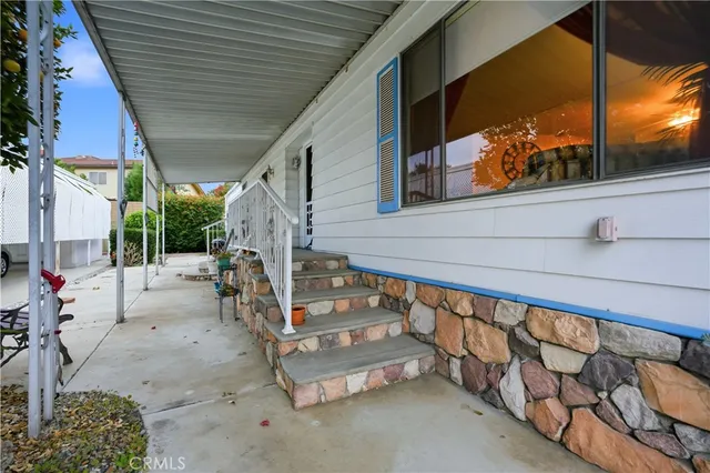 a view of entryway with wooden stairs