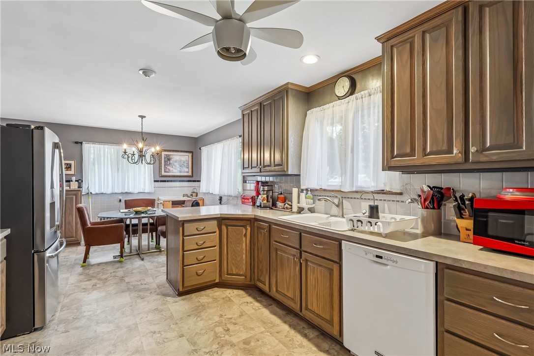 836 Jacoby Road Akron, OH 44333 - Photo 13 of 45 Kitchen with sink, ceiling light / fan, cabinets and all appliances