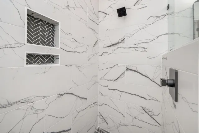 a bed room with a bed and a tv