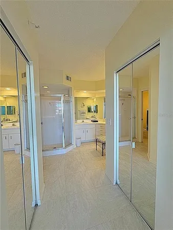a bathroom with a tub and a shower