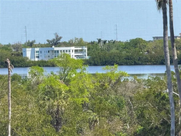 a view of a lake with building in front of it
