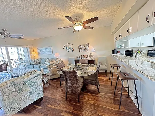a view of a dining room with furniture