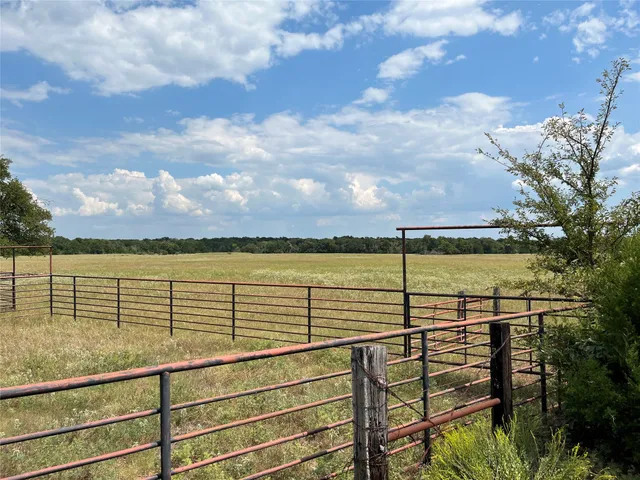a view of outdoor space with swimming pool and lake view