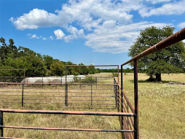 a view of swimming pool with seating area
