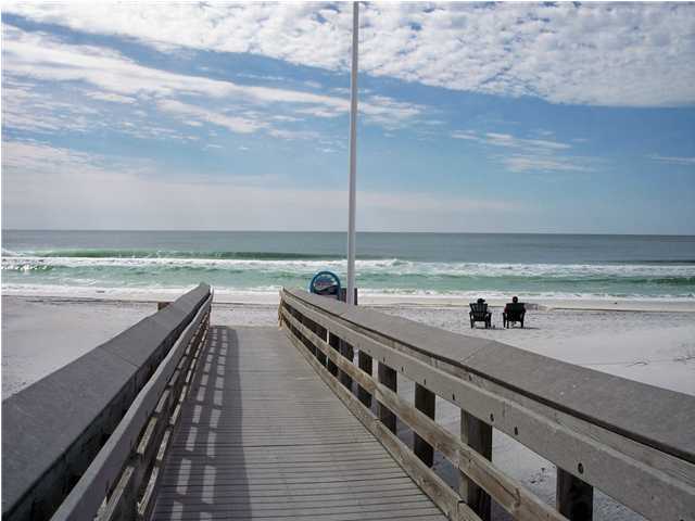 a view of swimming pool with seating space